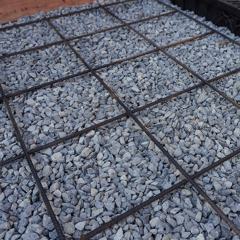 Heavy-duty 1800x1000mm reo mesh panel used as a vertical garden trellis for climbing plants in backyard setting.